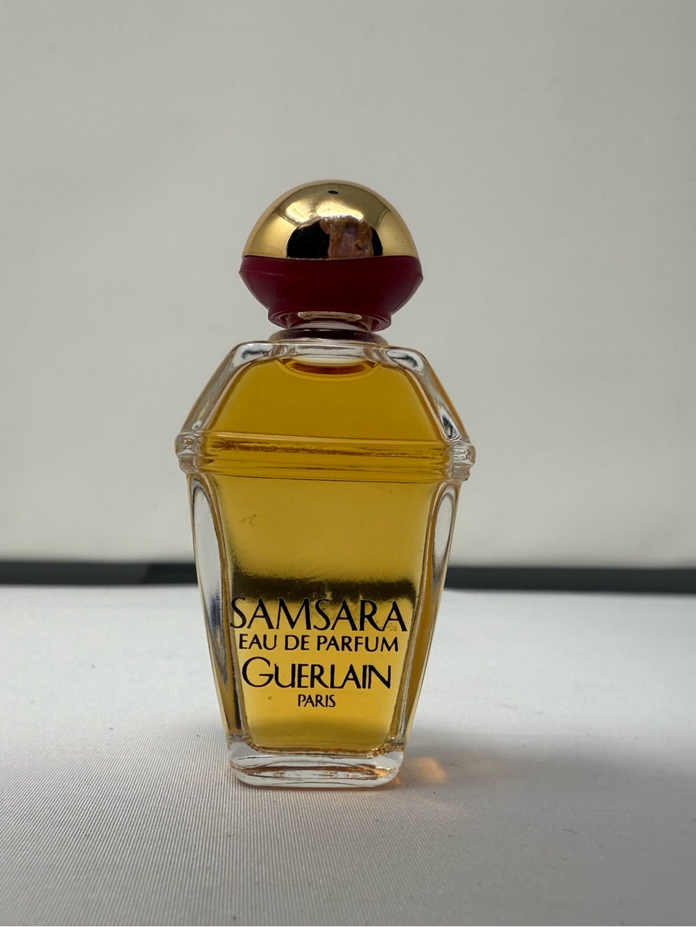 GUERLAIN Samsara Mini Bottle in Amber with Gold & Red Accents